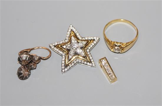 A 750 yellow metal and diamond star pendant, a 750 and claw set solitaire diamond ring, a 750 diamond line pendant etc.